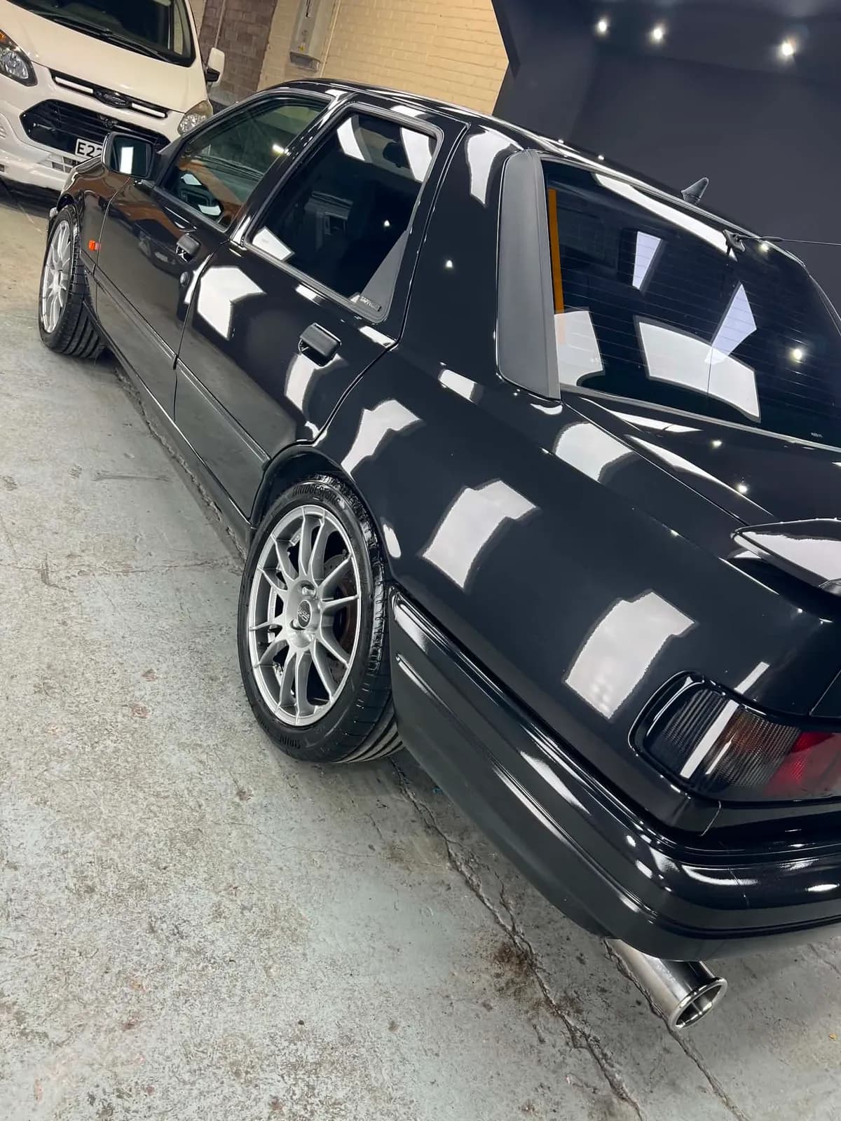 Ford Sierra Sapphire RS rear three-quarter view showing deep reflections